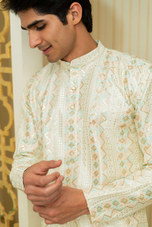 The Heavy Off-White Long Kurta With Tribal Stripe Thread Work And Sequins