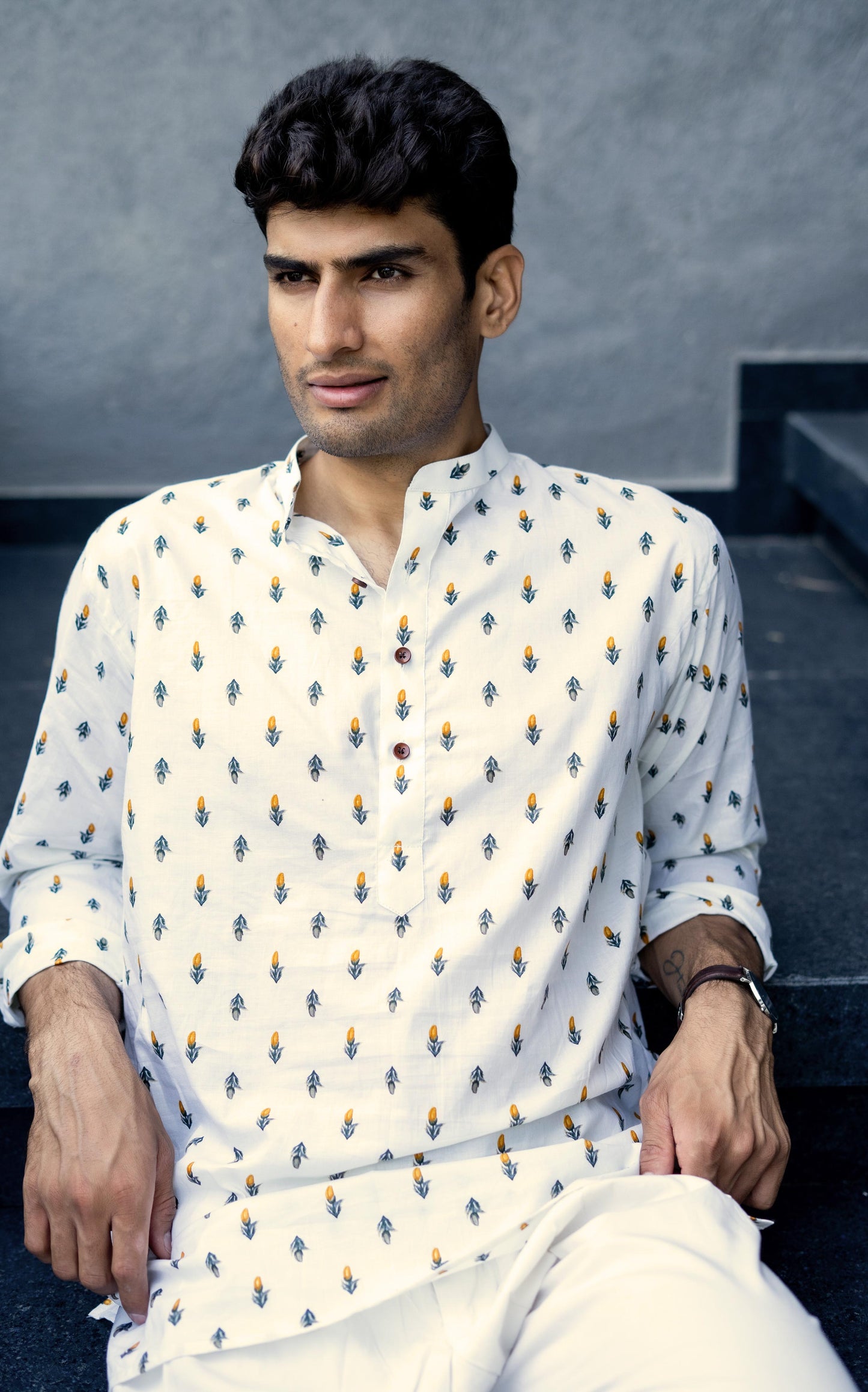 The Cream Color Short Kurta With Orange Flower Print