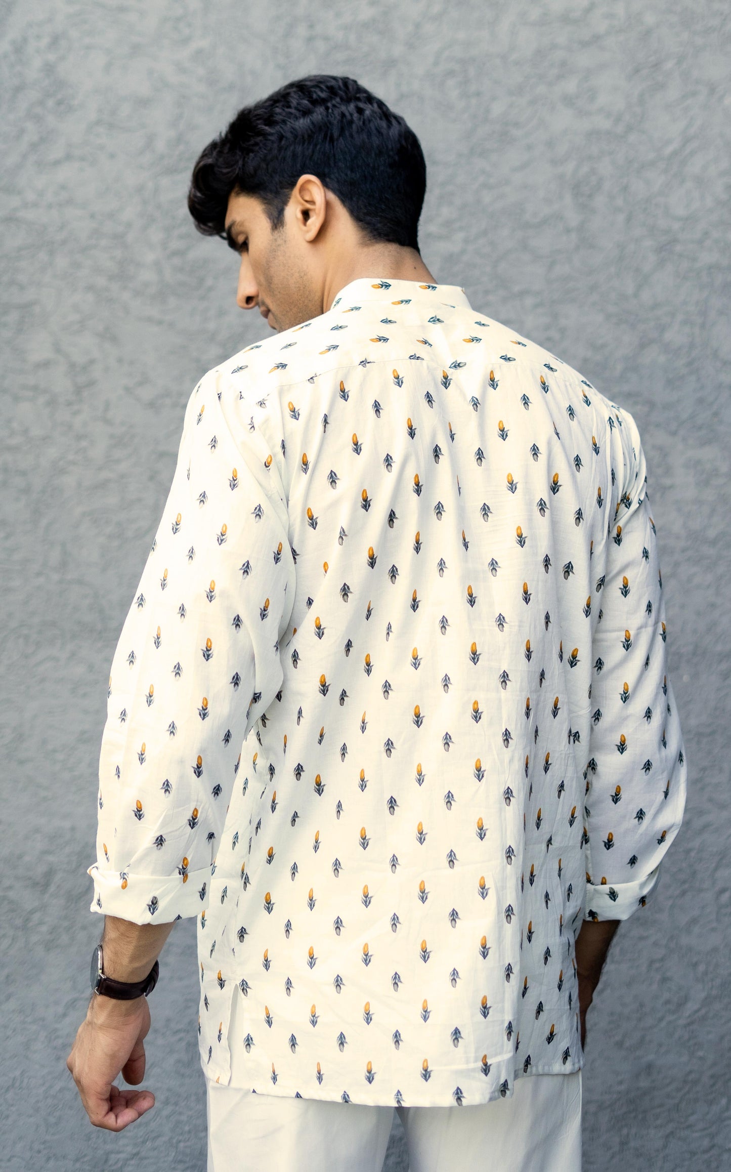 The Cream Color Short Kurta With Orange Flower Print