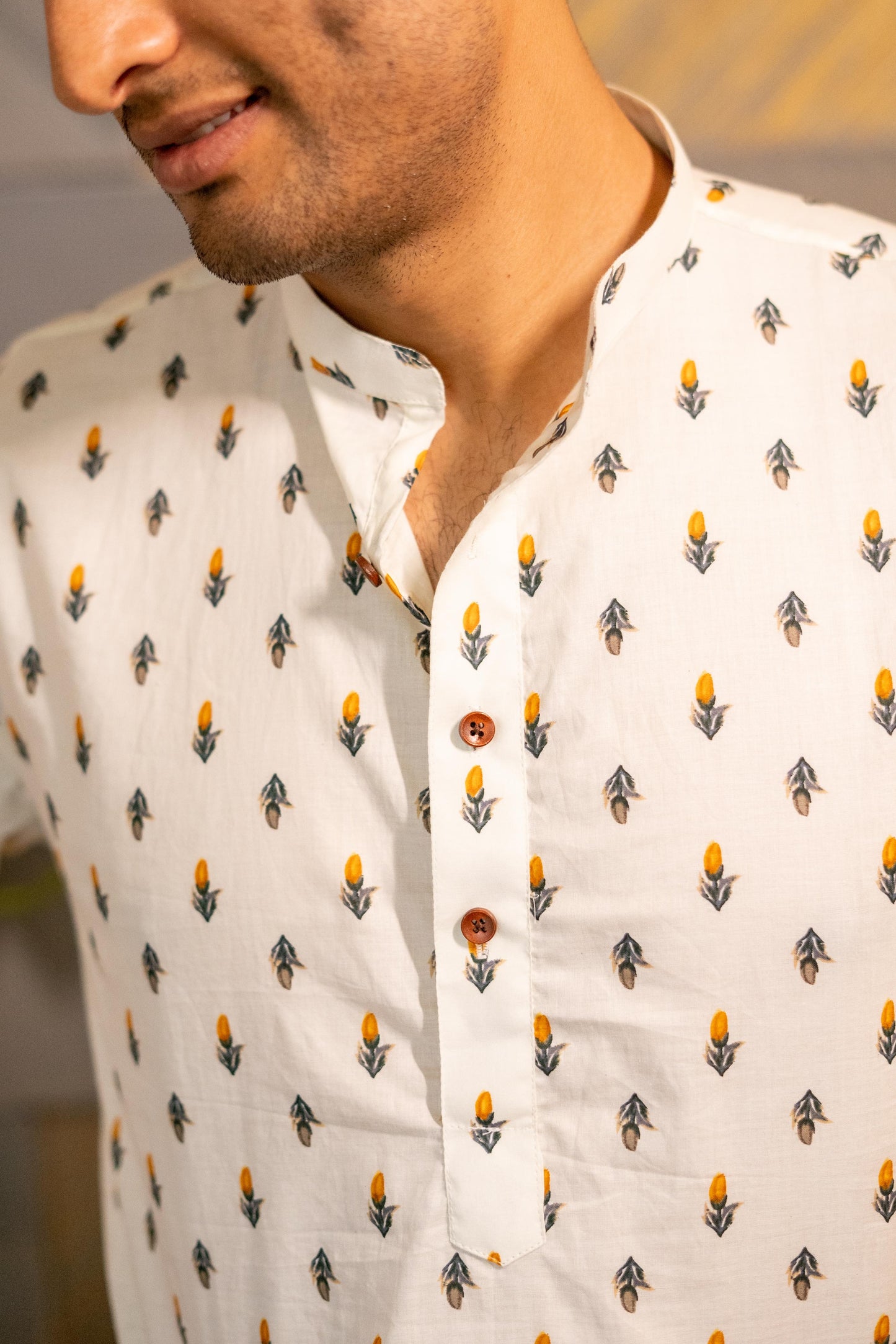 The Cream Color Long Kurta With Orange Flower Print