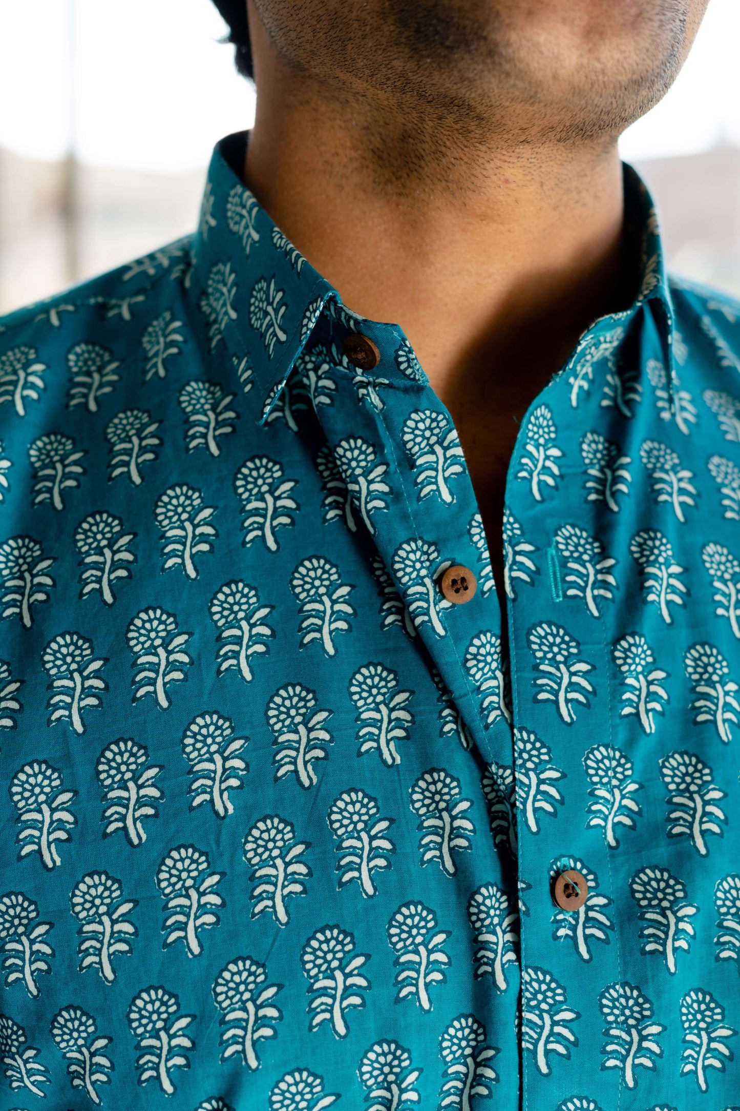 The Teal Color Shirt With White Floral Butti Print