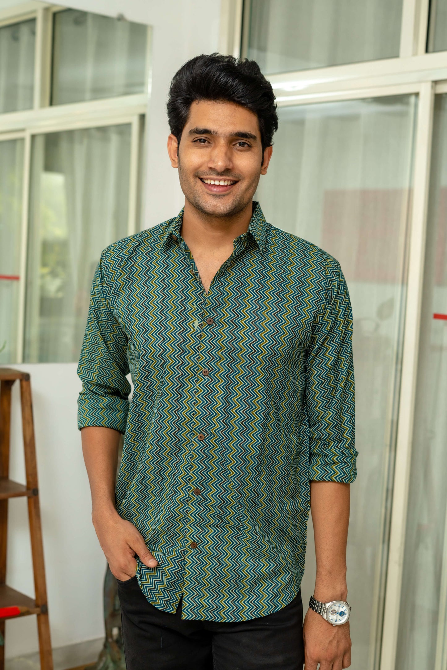 Indian man wearing green colour shirt