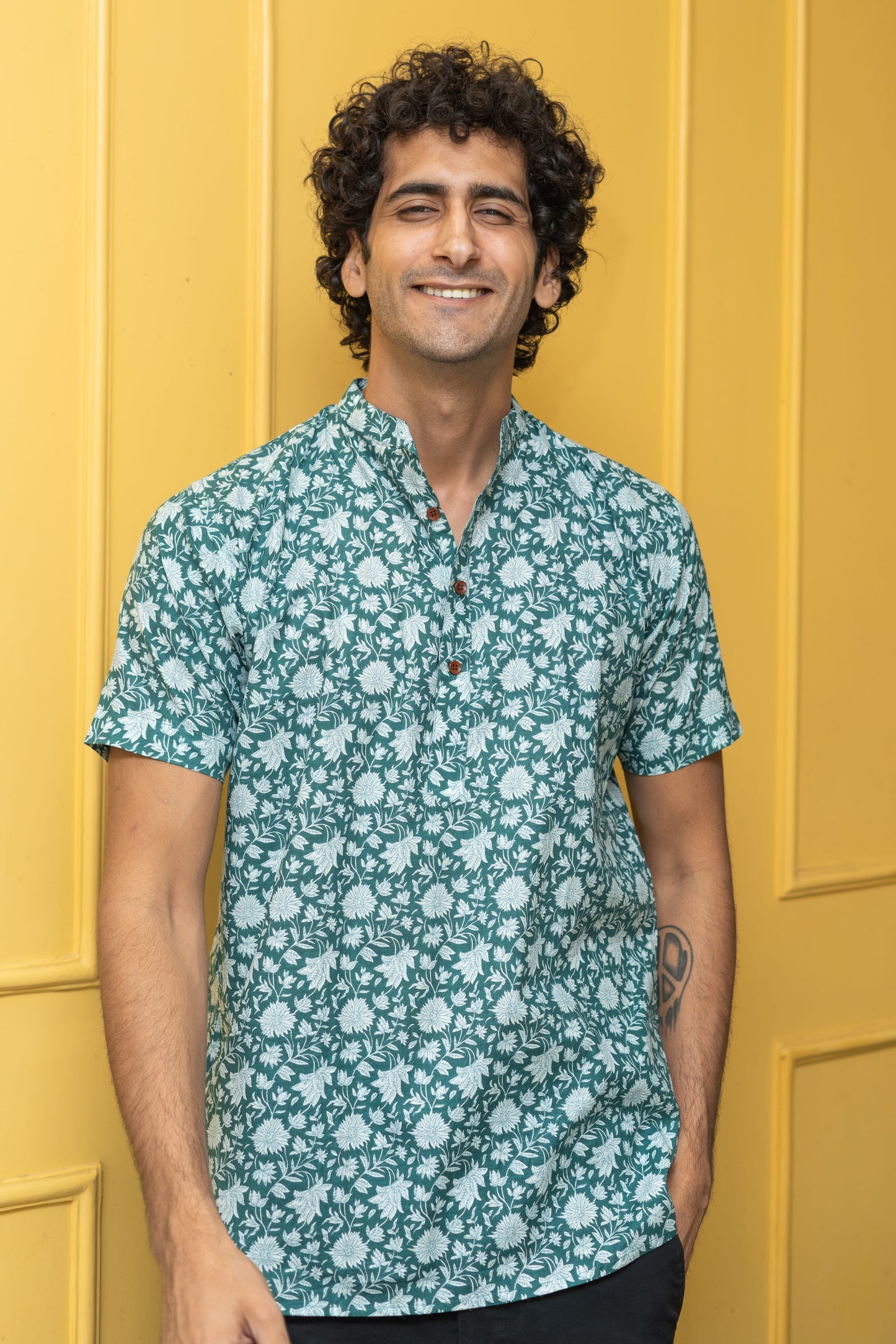The Emerald Green All-Over Floral Print Half Sleeves Short Kurta