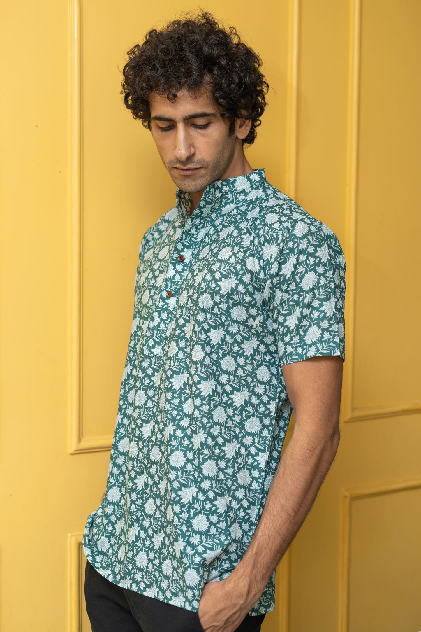 The Emerald Green All-Over Floral Print Half Sleeves Short Kurta