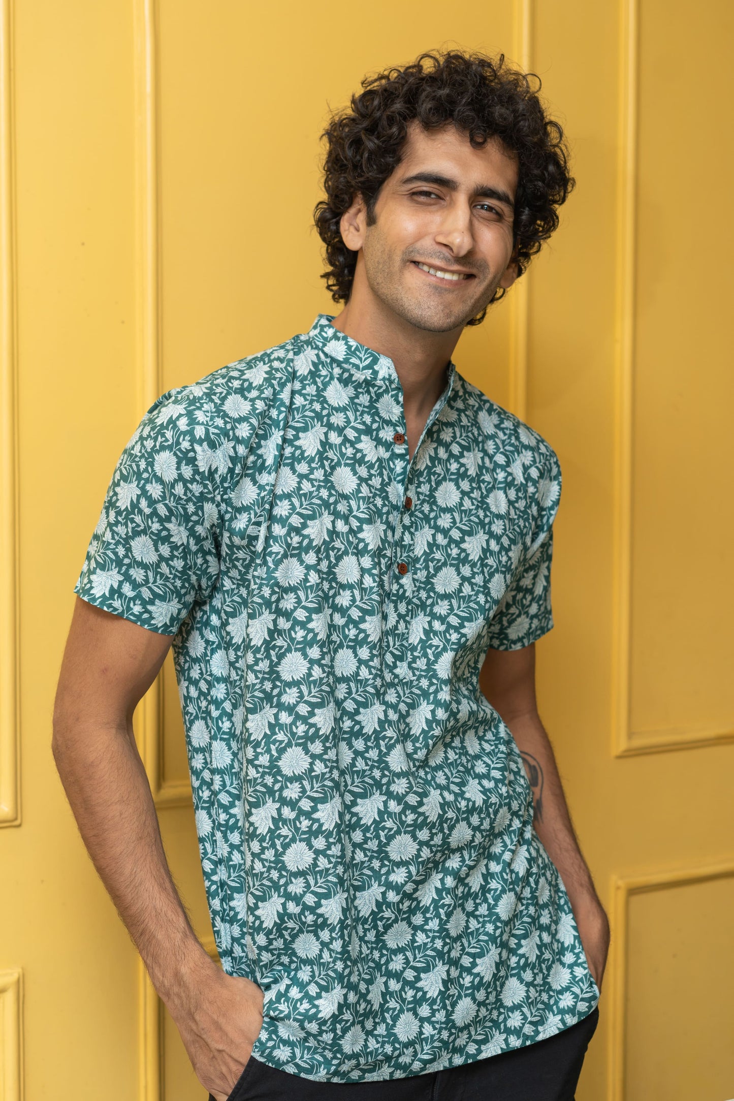The Emerald Green All-Over Floral Print Half Sleeves Short Kurta