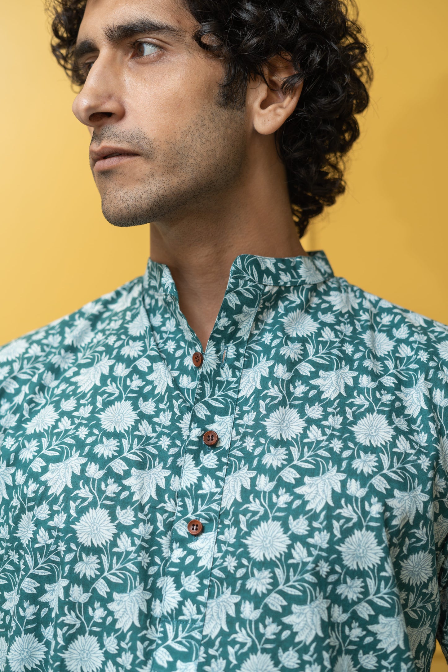 The Emerald Green All-Over Floral Print Half Sleeves Short Kurta