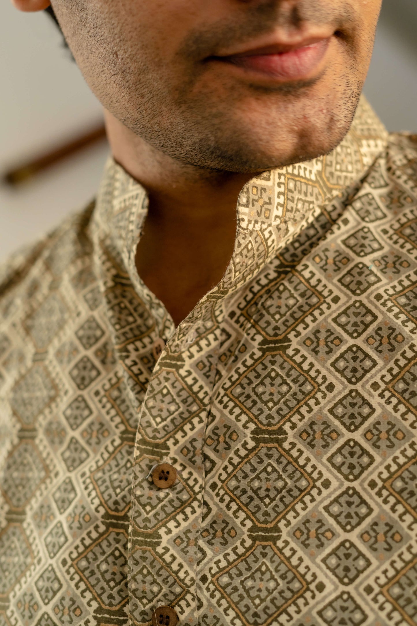 The Off-White And Olve Green Tribal Print Short Kurta