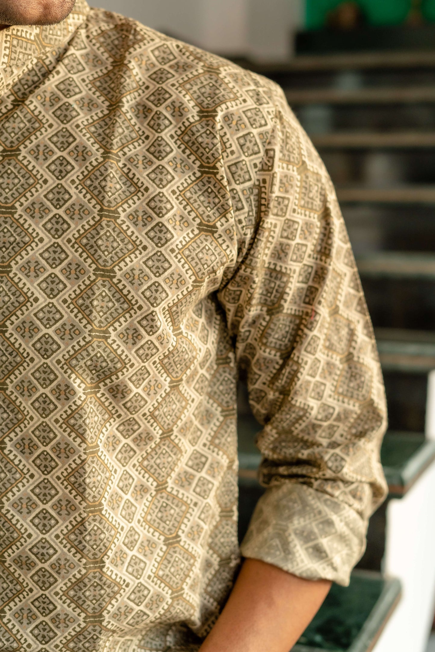 The Off-White And Olve Green Tribal Print Short Kurta