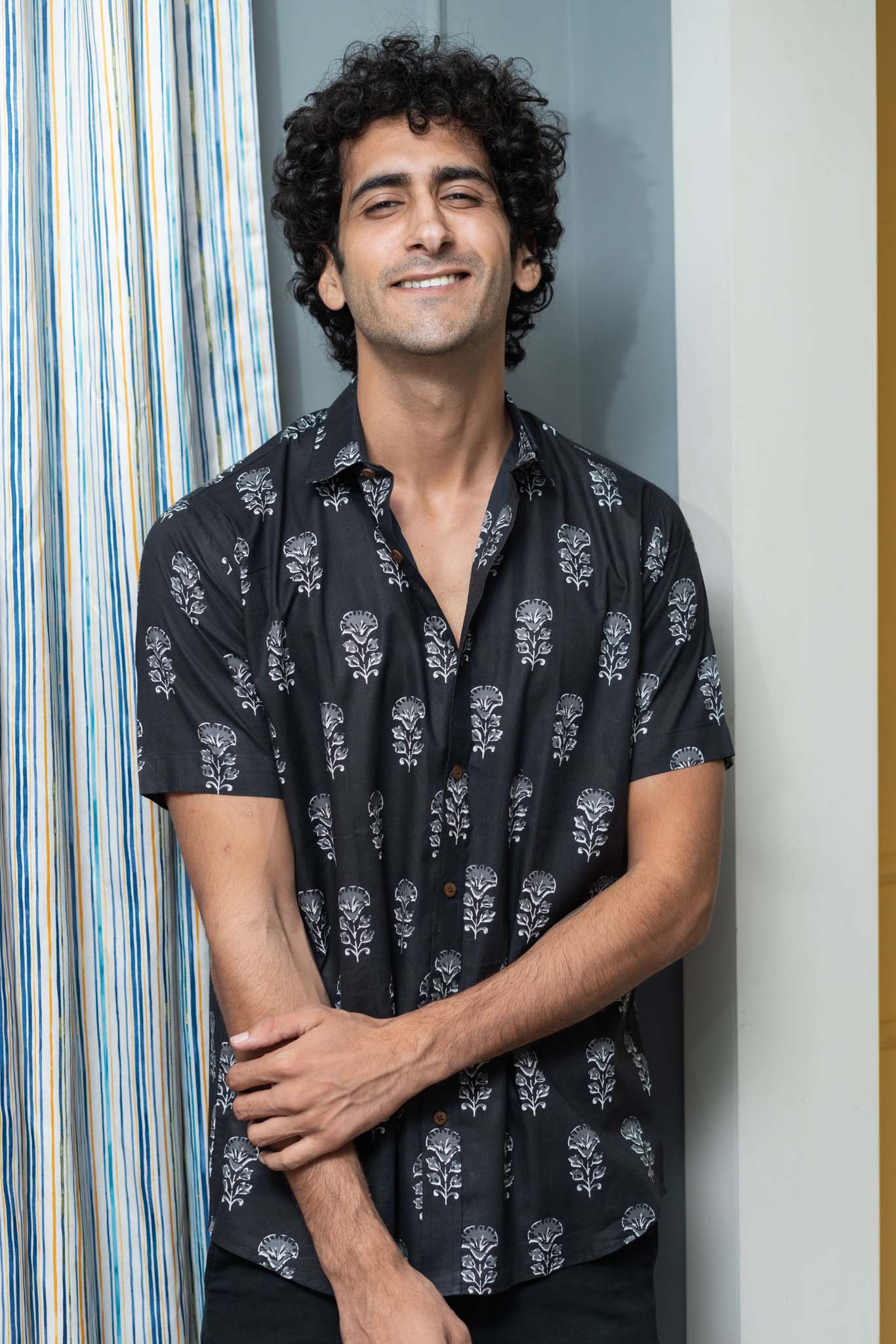 The Black Half Sleeves Shirt With White Flower Print