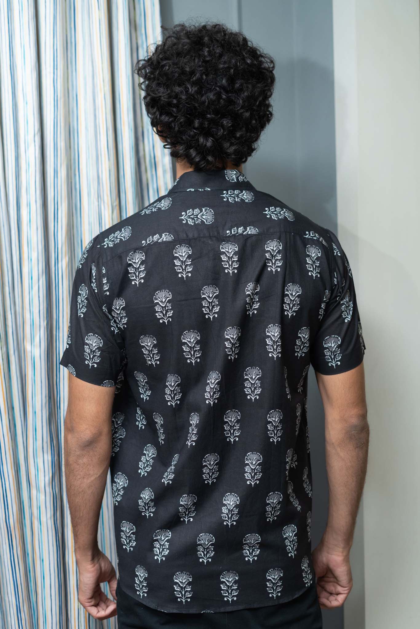 The Black Half Sleeves Shirt With White Flower Print