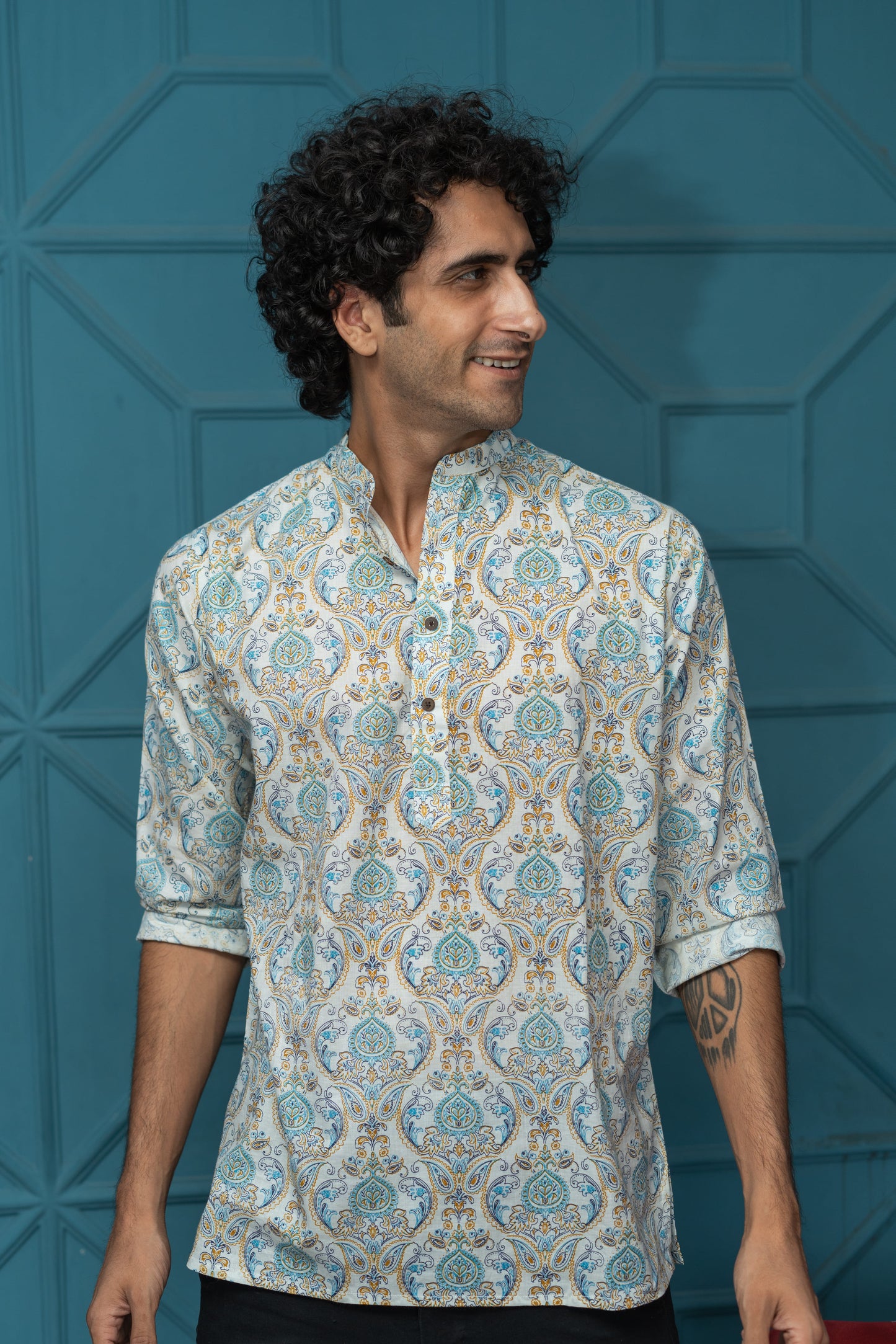 The White Short Kurta With Blue Ethnic Floral Print