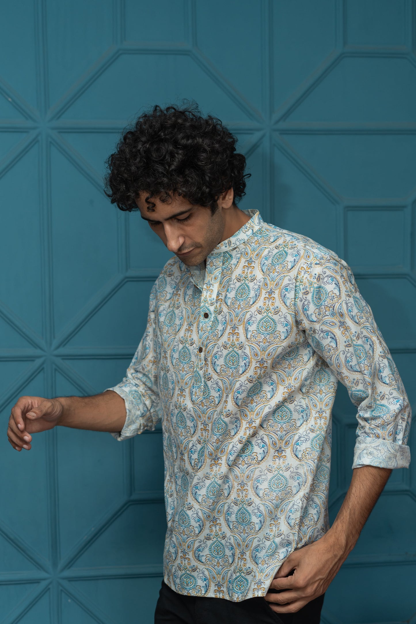 The White Short Kurta With Blue Ethnic Floral Print