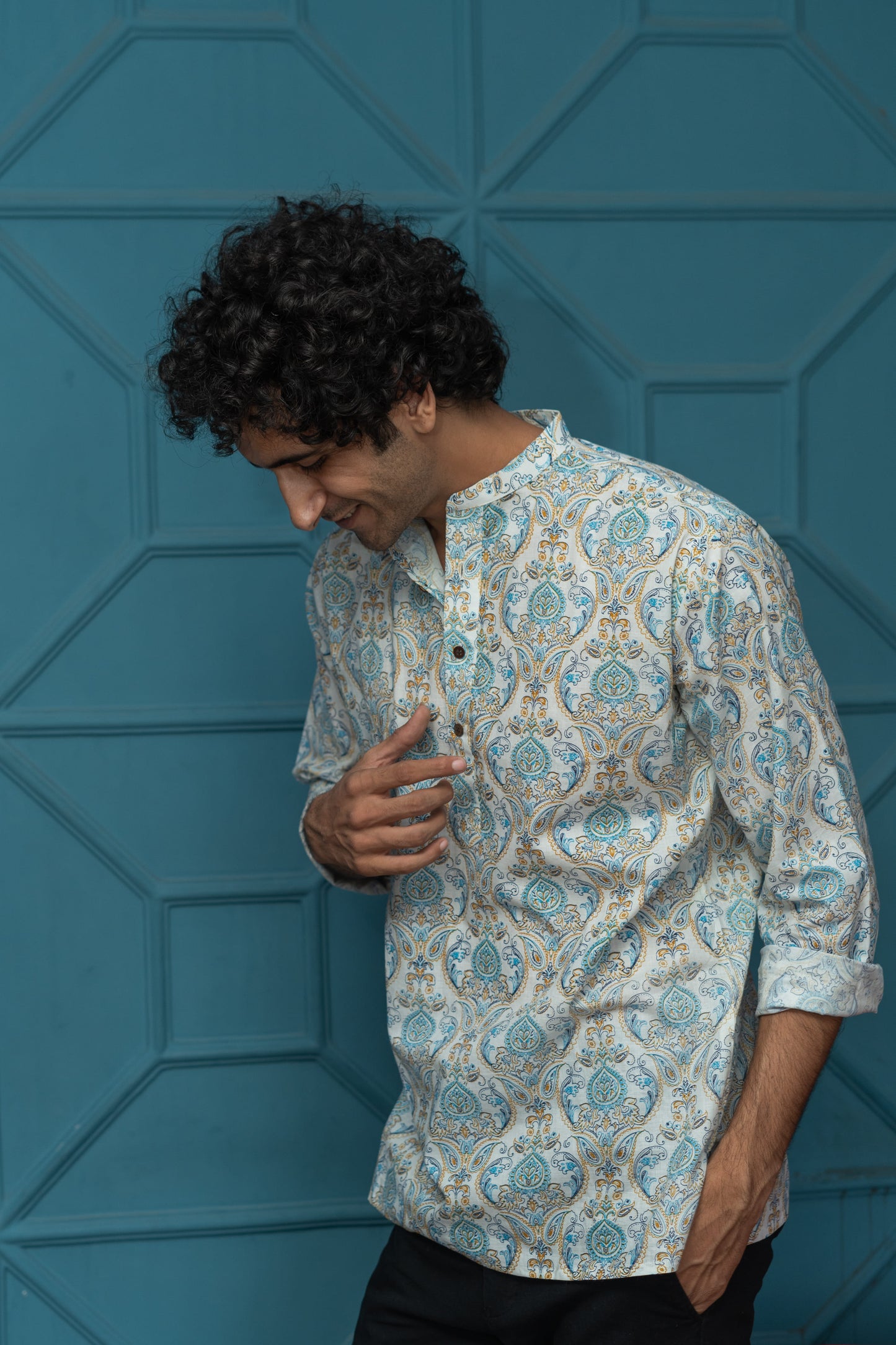 The White Short Kurta With Blue Ethnic Floral Print