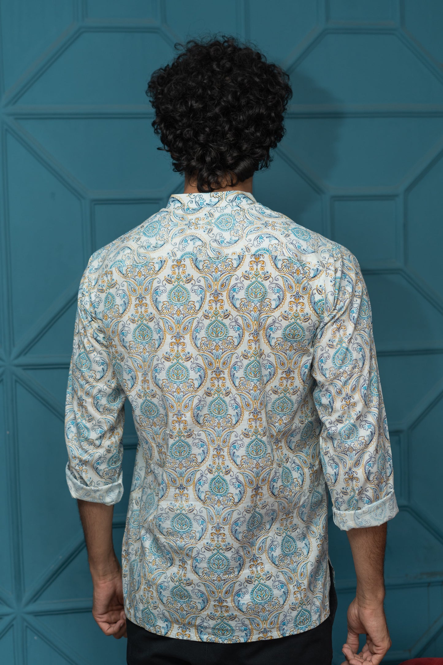 The White Short Kurta With Blue Ethnic Floral Print