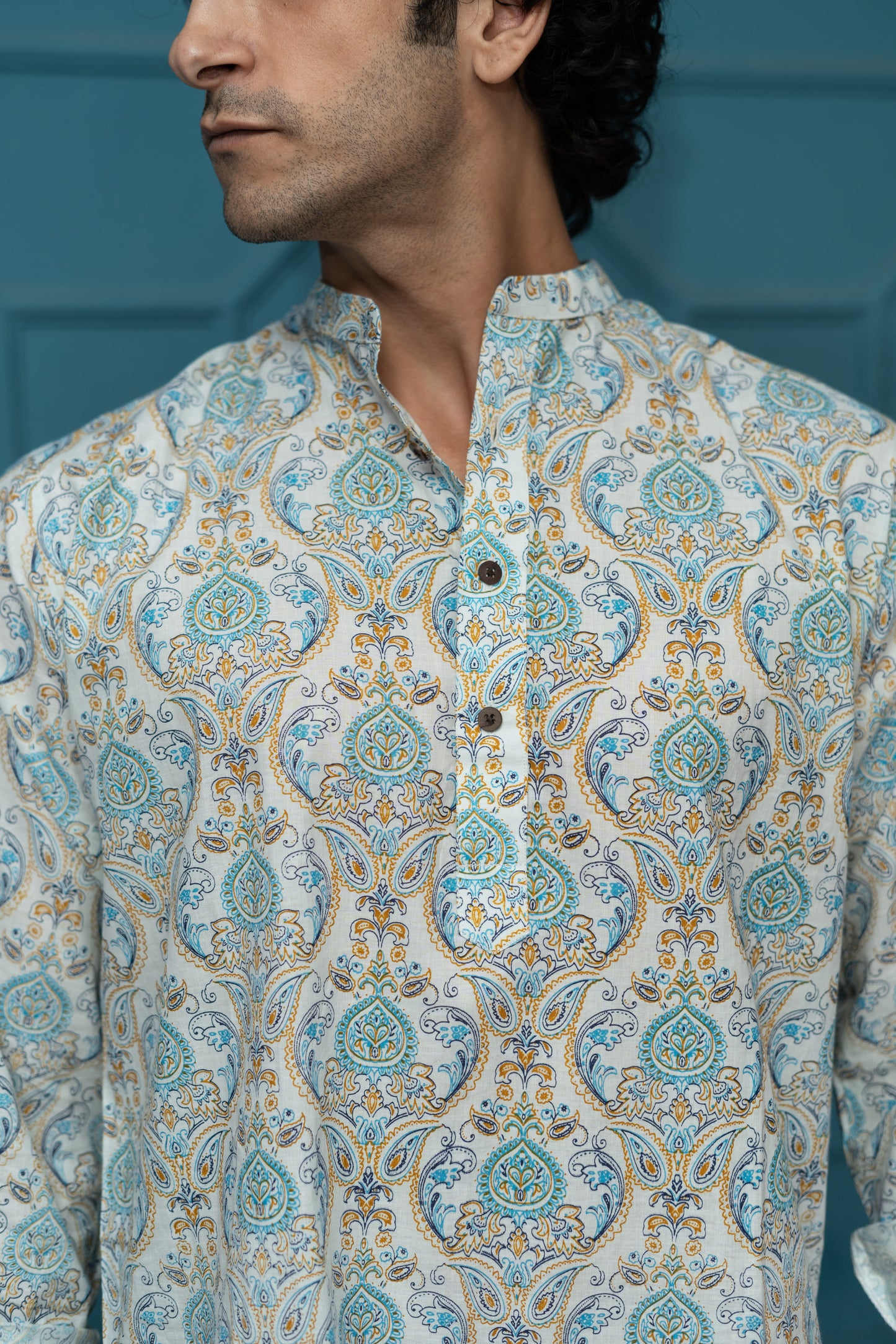 The White Short Kurta With Blue Ethnic Floral Print