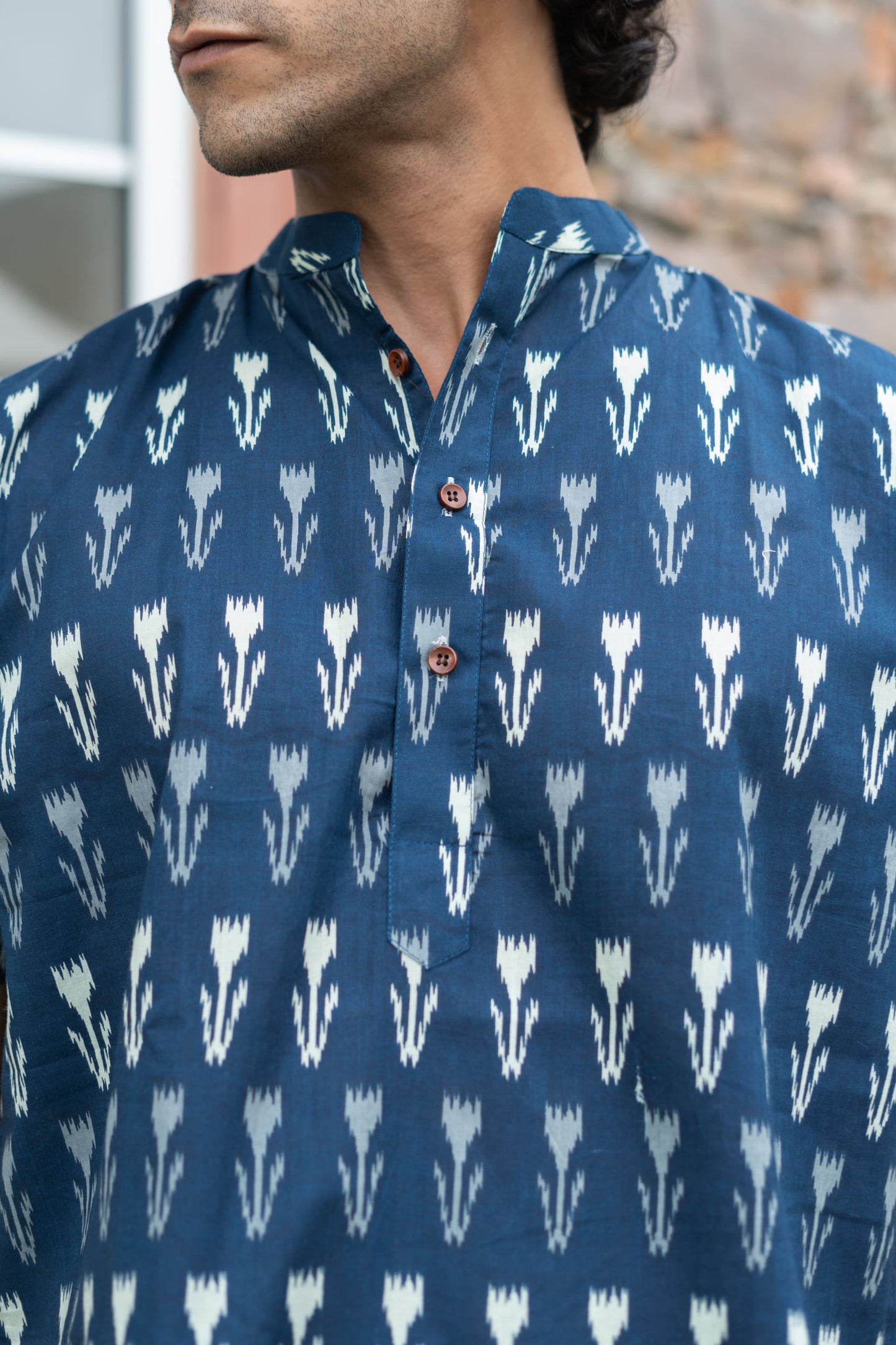 The Navy Blue Ikat Print Half Sleeves Short Kurta