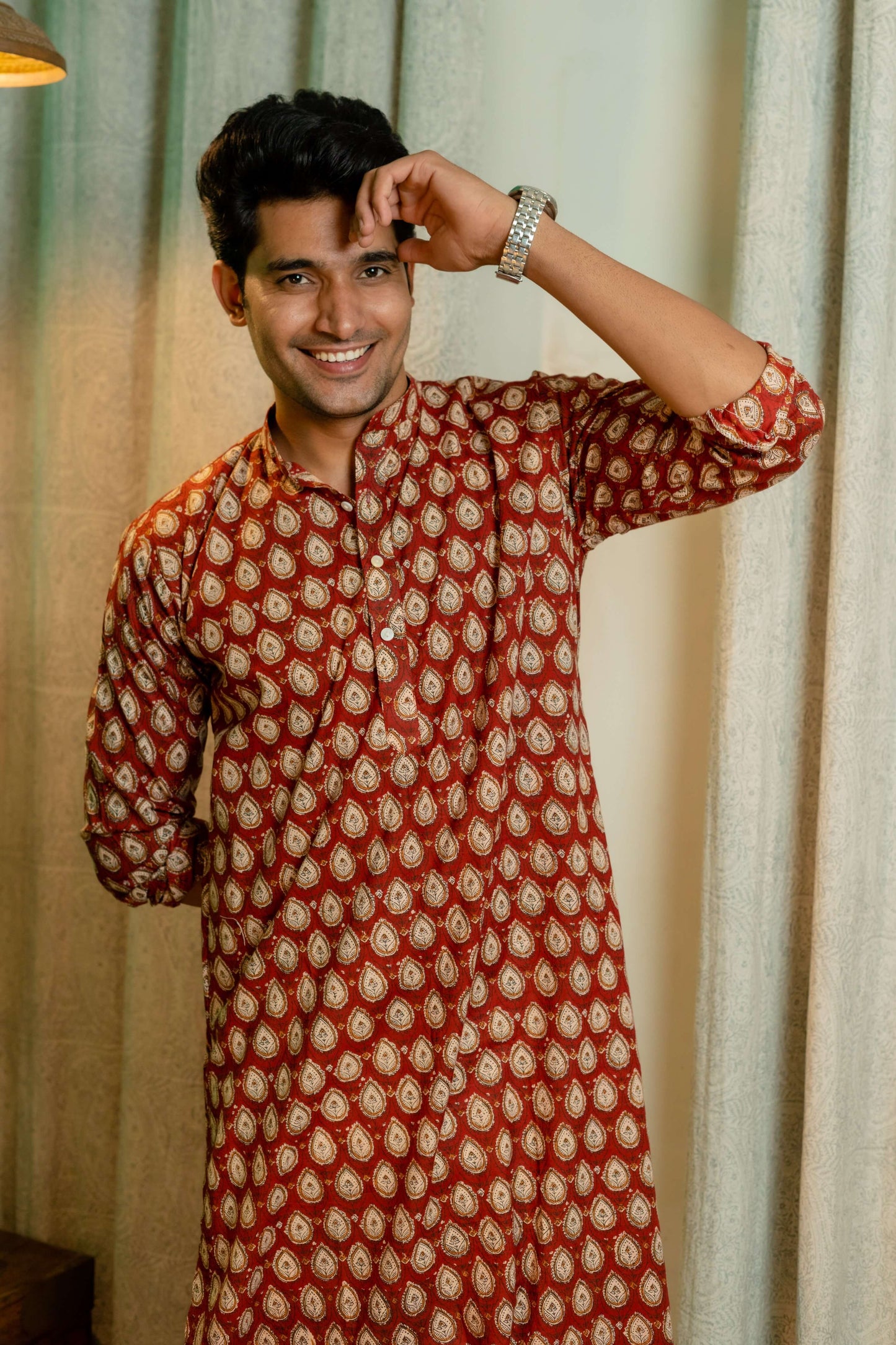 An Indian Men In Bagru Red Floral Print Kurta