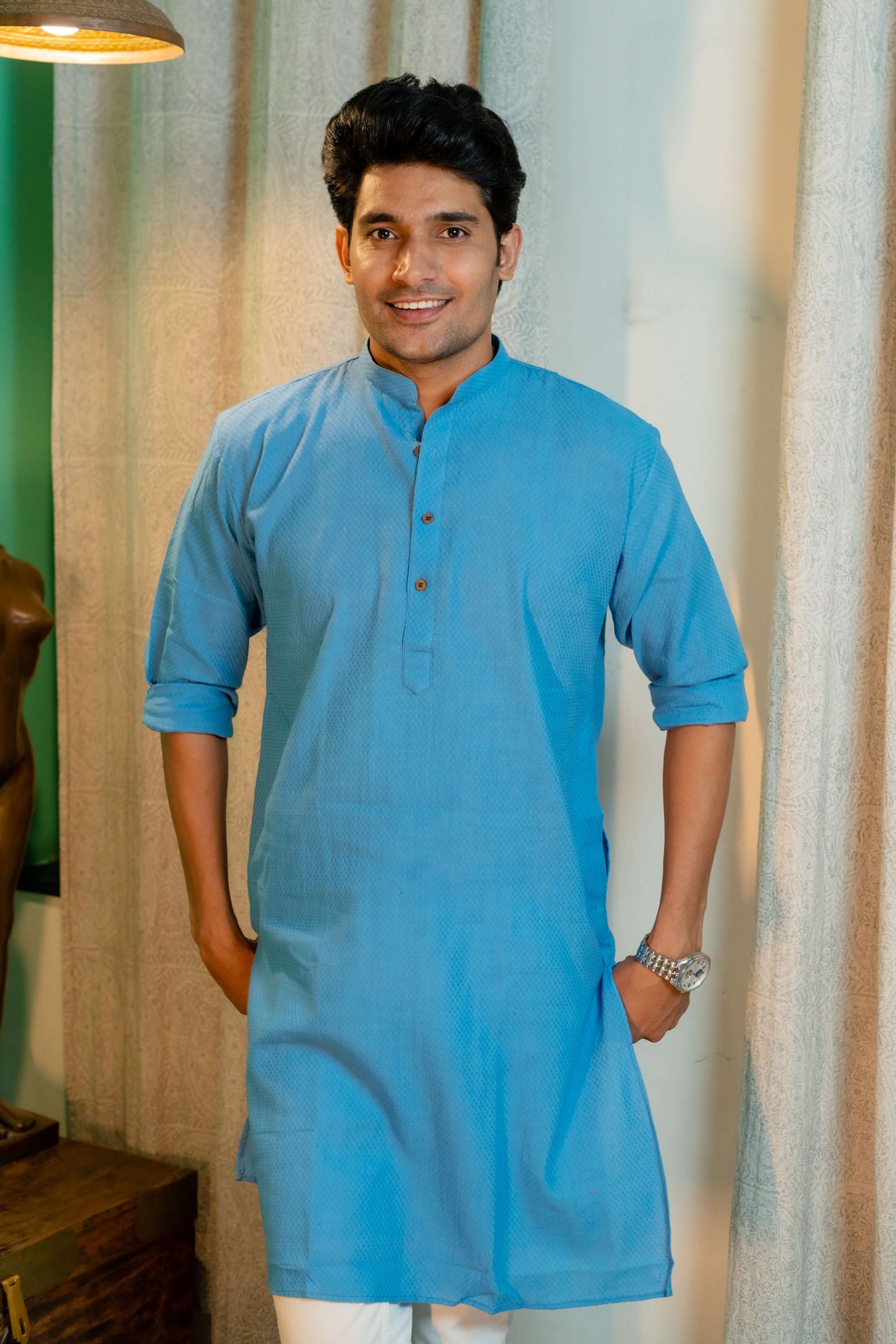 An Indian Man Wearing Blue Color Men's Long Kurta