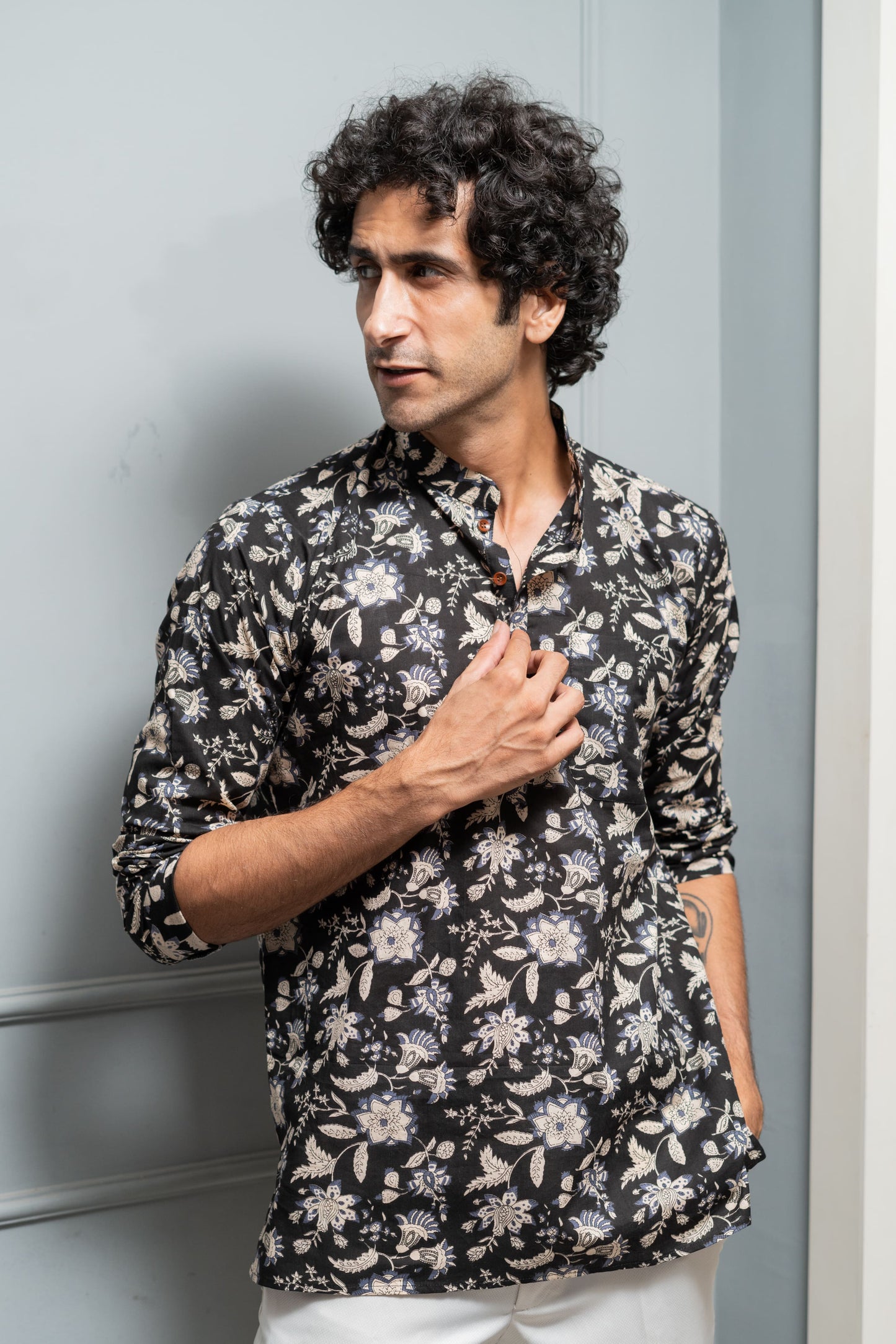 The Black And Off-White Short Kurta With All-Over Floral Print