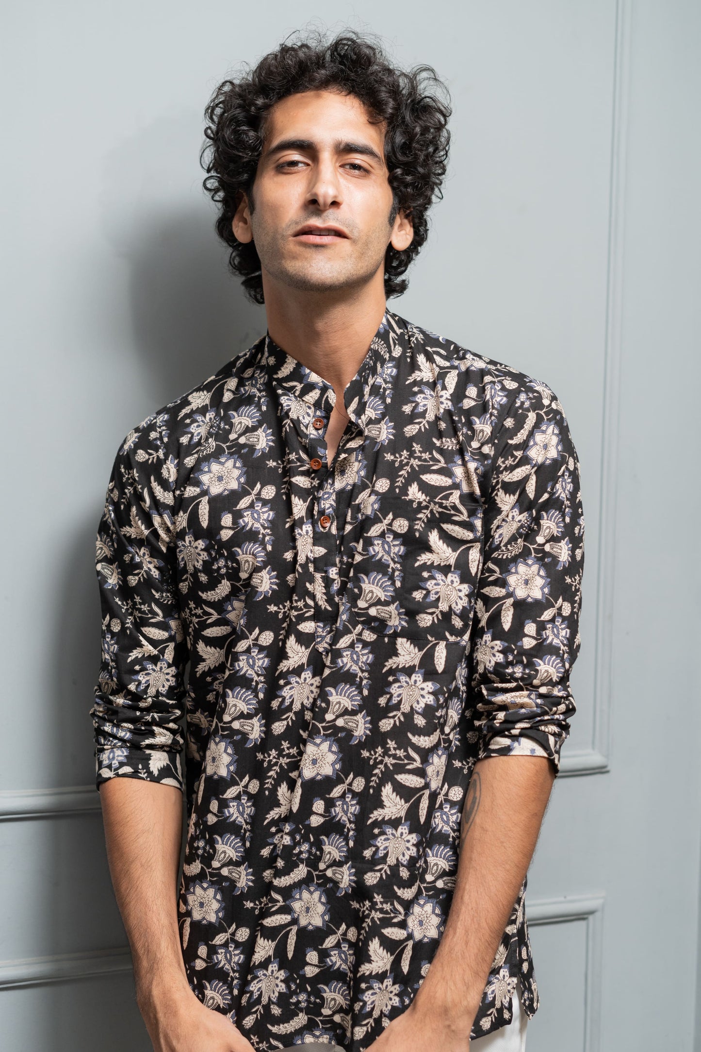 The Black And Off-White Short Kurta With All-Over Floral Print
