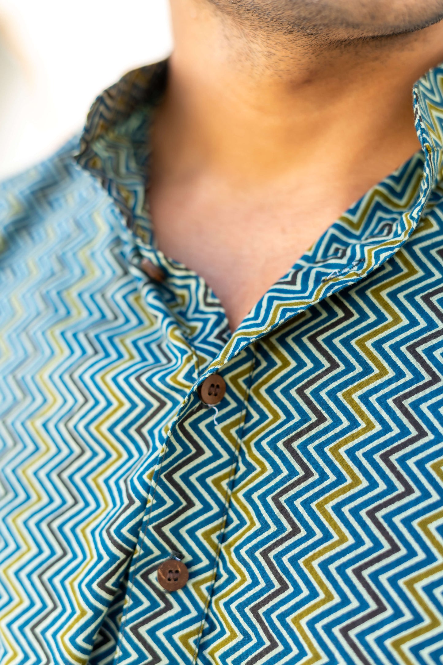 Close-up look of Green And Mustard Tribal Zig-Zag Print Short Kurta
