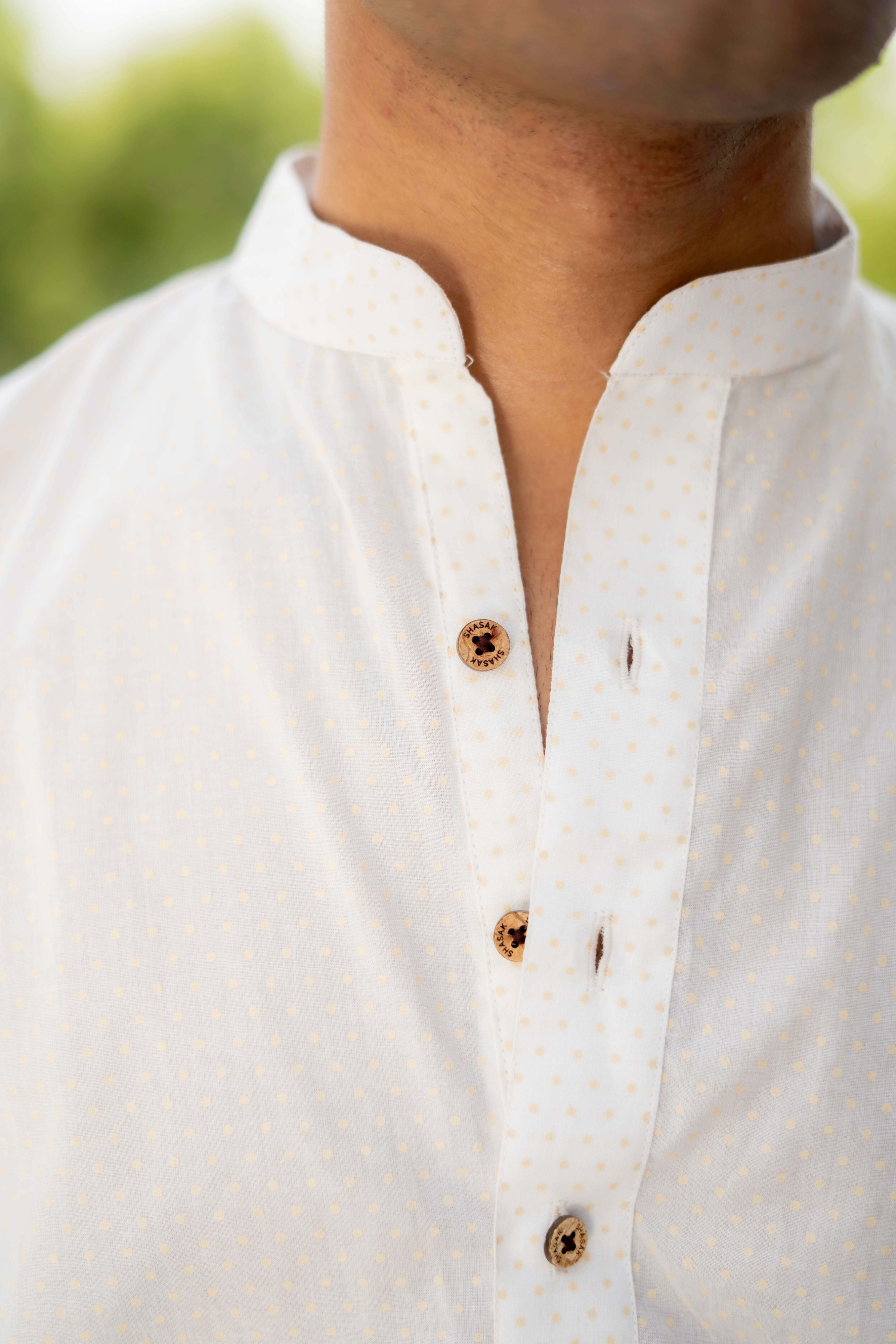The White Short Kurta with Golden Polka Dots