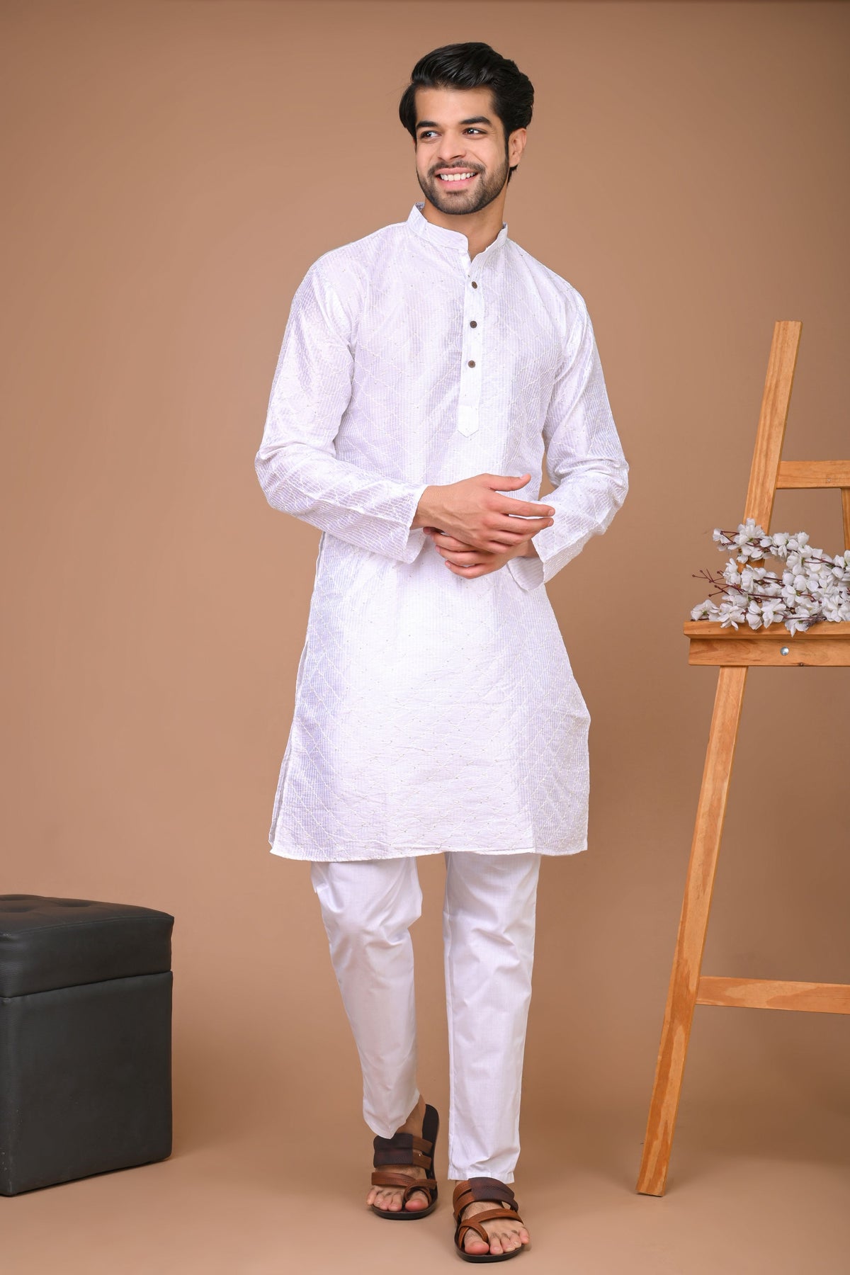 indian man wearing white kurta pajama
