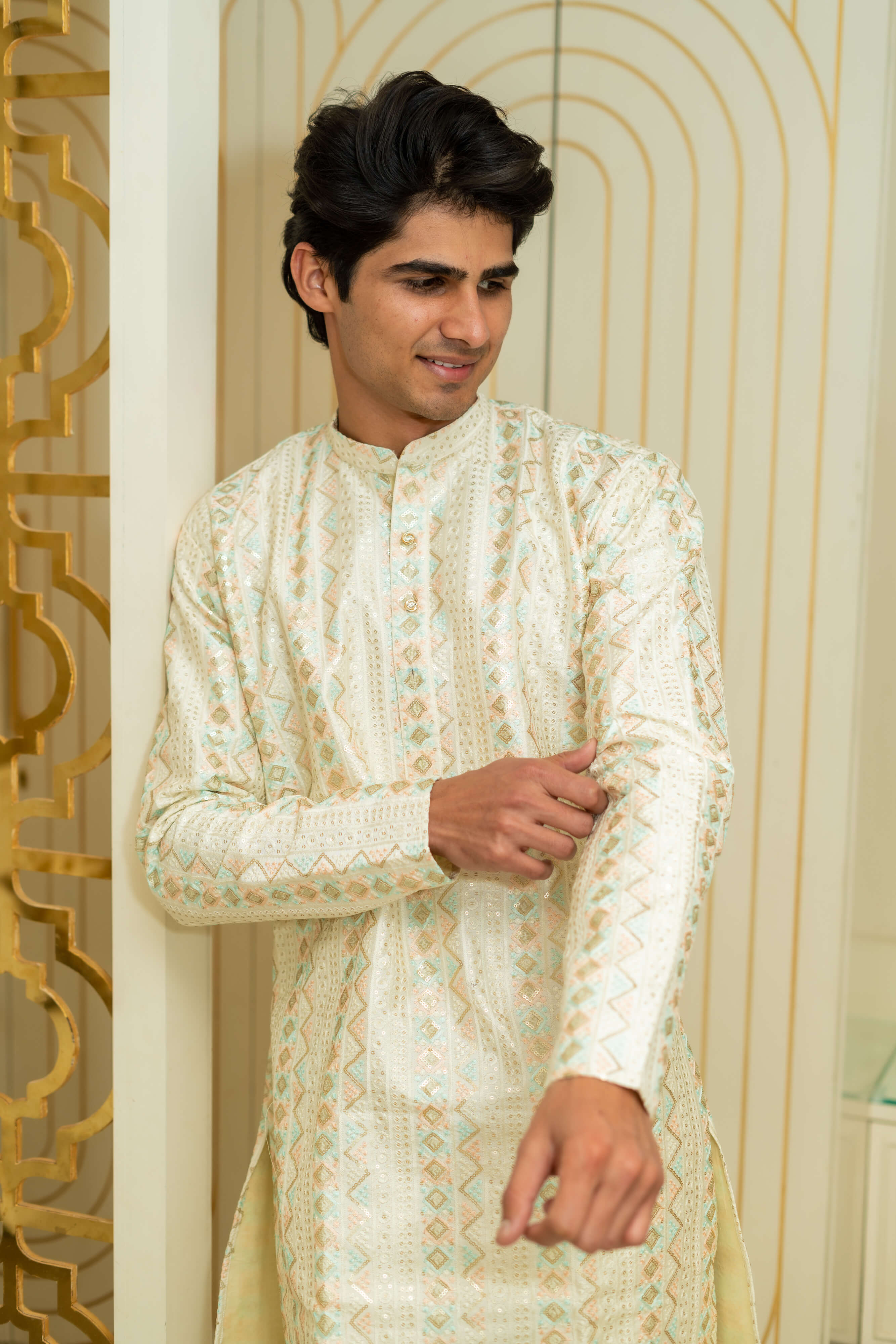 The Heavy Off-White Long Kurta With Tribal Stripe Thread Work And Sequins