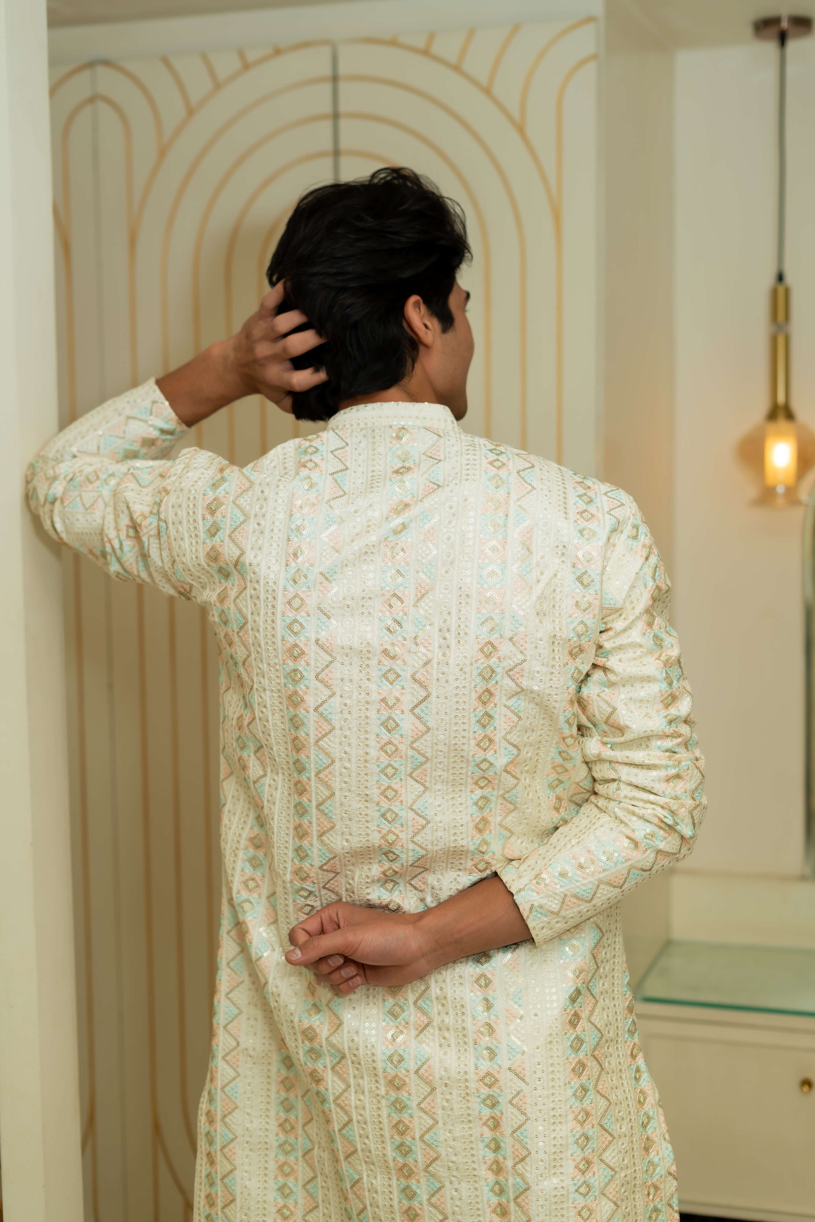 The Heavy Off-White Long Kurta With Tribal Stripe Thread Work And Sequins