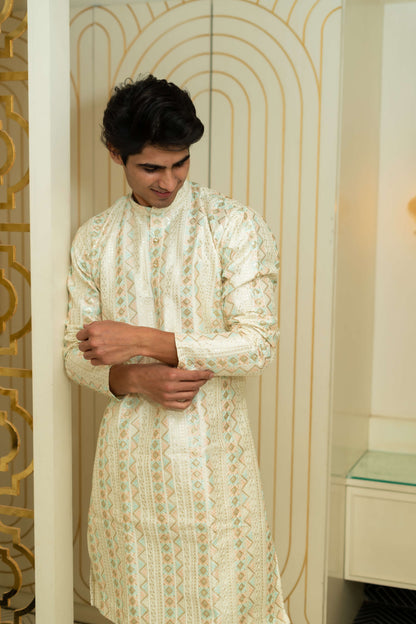 The Heavy Off-White Long Kurta With Tribal Stripe Thread Work And Sequins