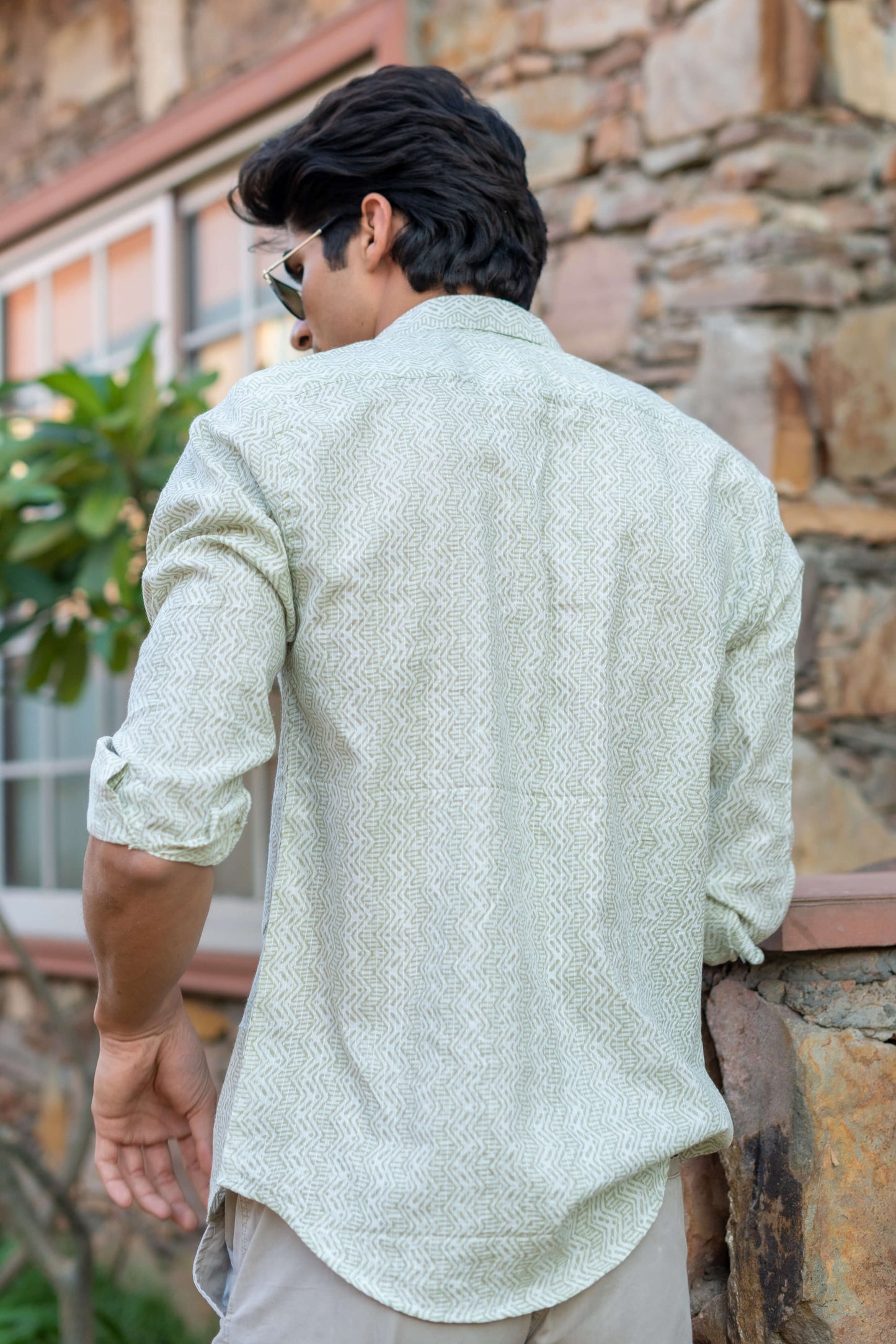 Featuring a White Color Shirt with a Green Tribal Print