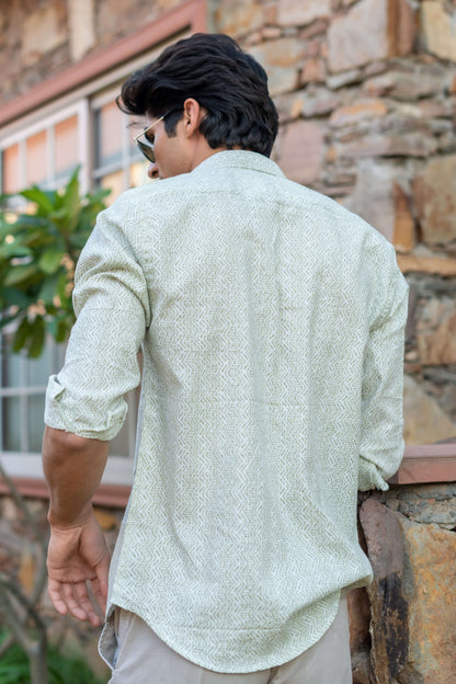 Featuring a White Color Shirt with a Green Tribal Print