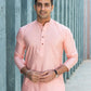 Indian man wearing pink short kurta for men