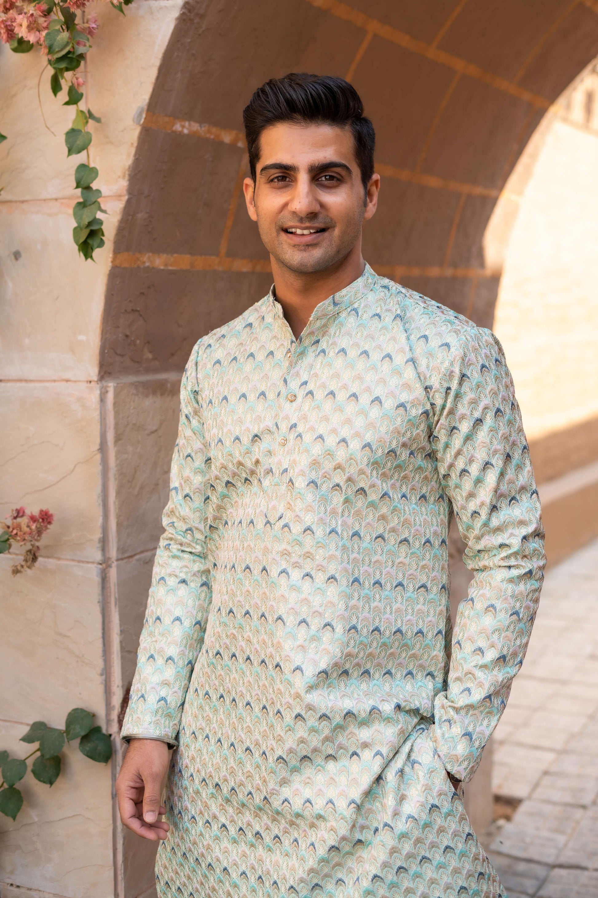 Indian man wearing embroidery work sea green long kurta