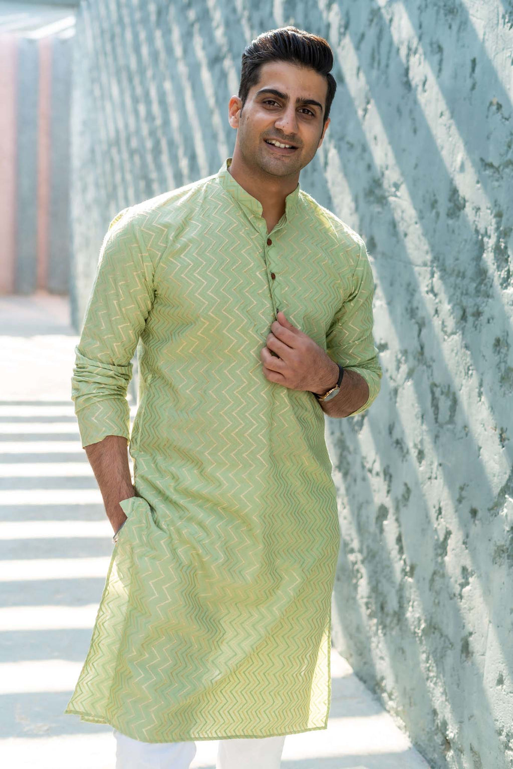 The Golden Zigzag Embroidery Work Long Kurta In Pastel Green Color