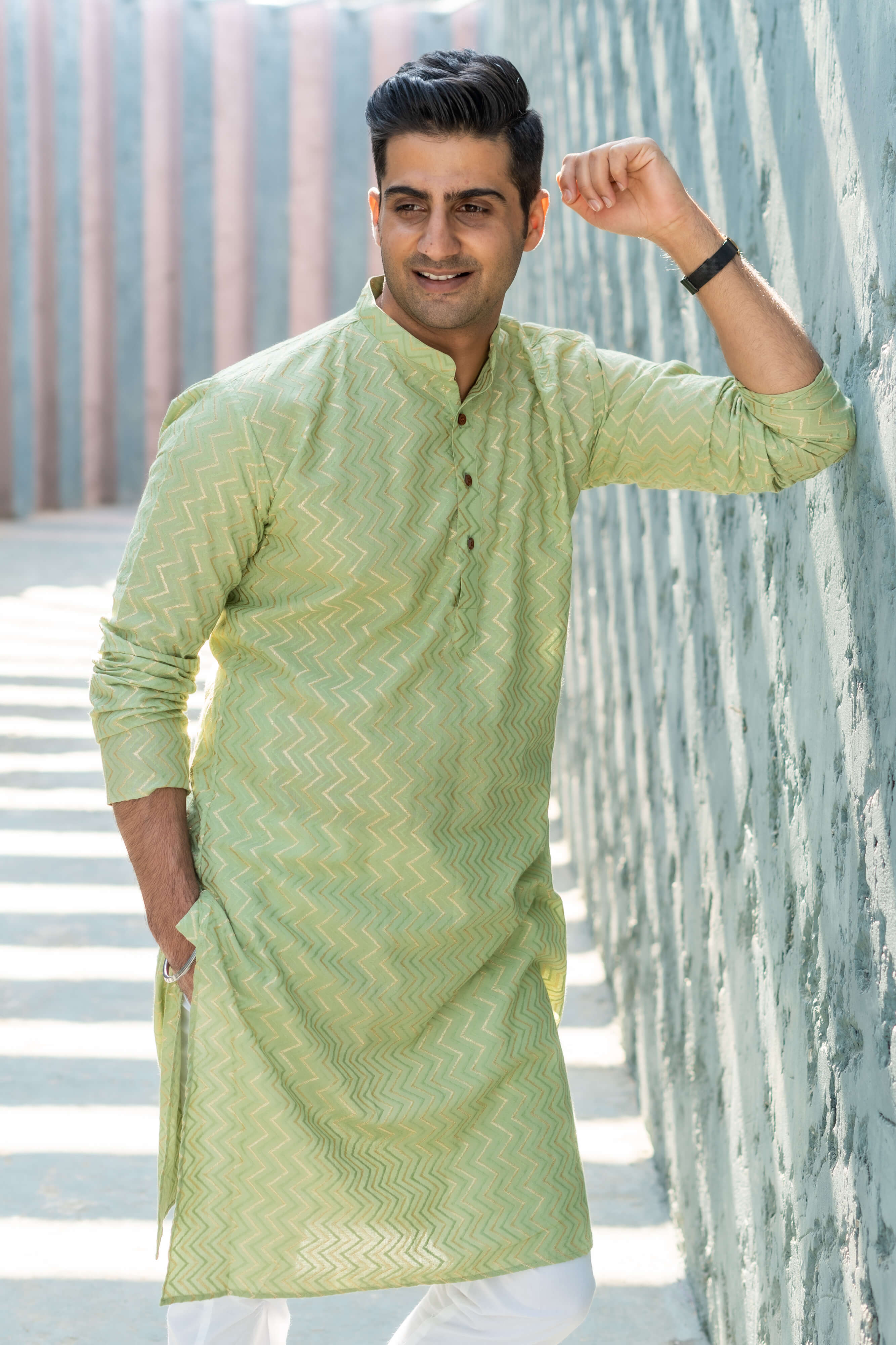 The Golden Zigzag Embroidery Work Long Kurta In Pastel Green Color
