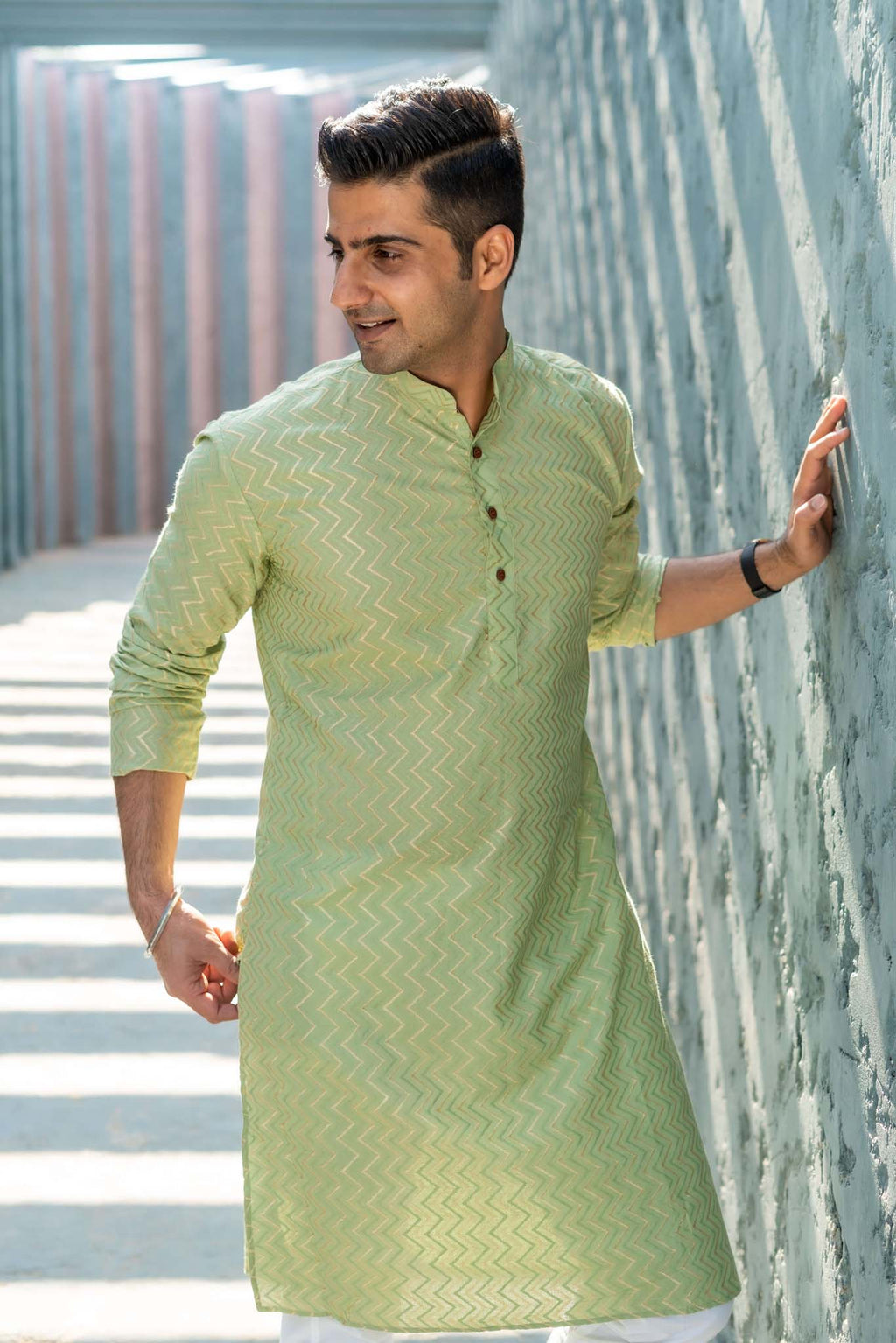 The Golden Zigzag Embroidery Work Long Kurta In Pastel Green Color