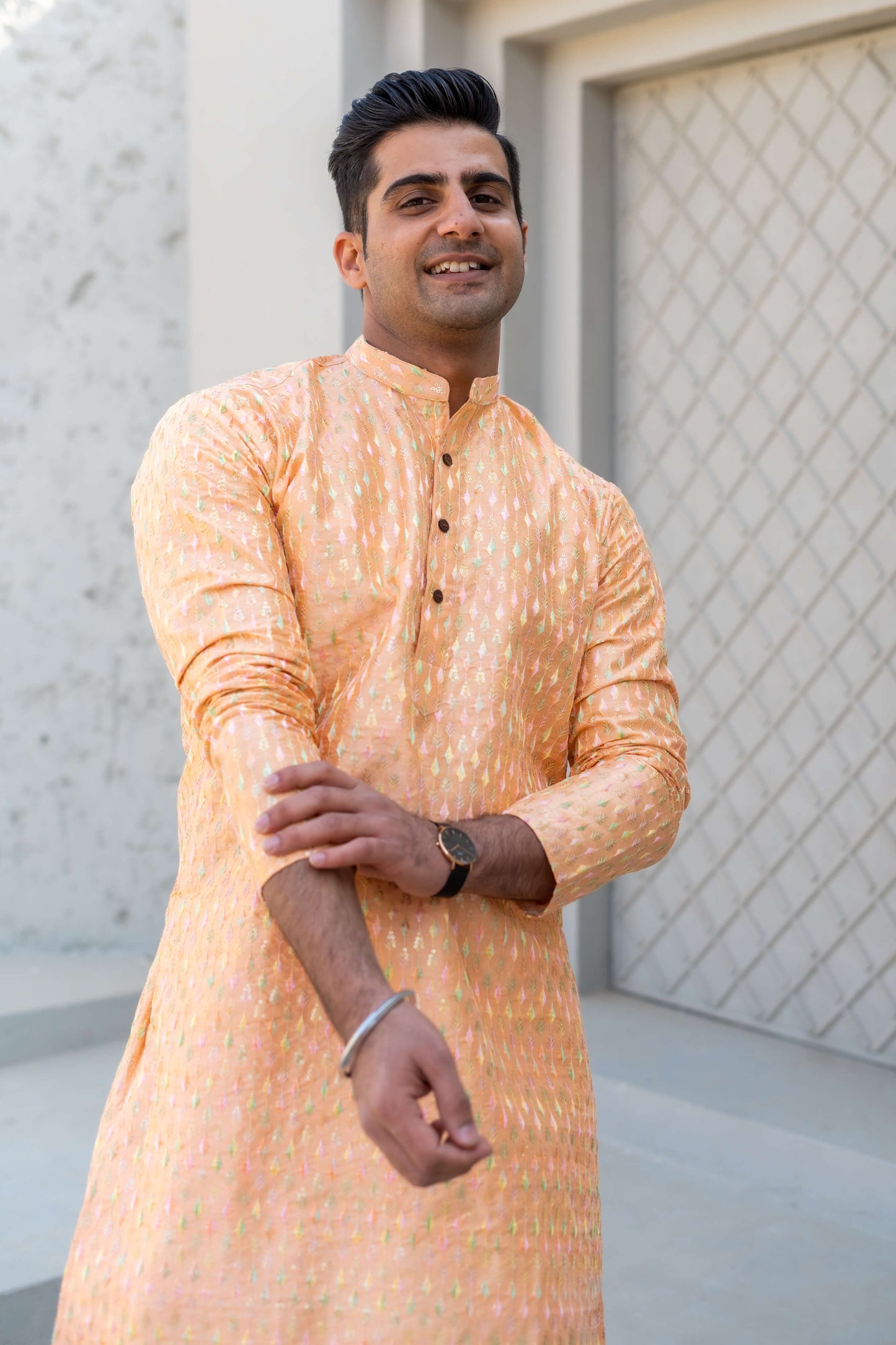 Indian man in saffron kurta