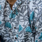 The Off-White All-Over Floral Print Short Kurta With Turquoise Flowers