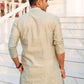 The Greyish Green Colour Long Kurta With Embroidered Golden Ikat Design