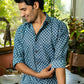 Men Wearing Blue Color Shirt and Folding Sleeves
