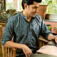 Indian man wearing navy blue short kurta