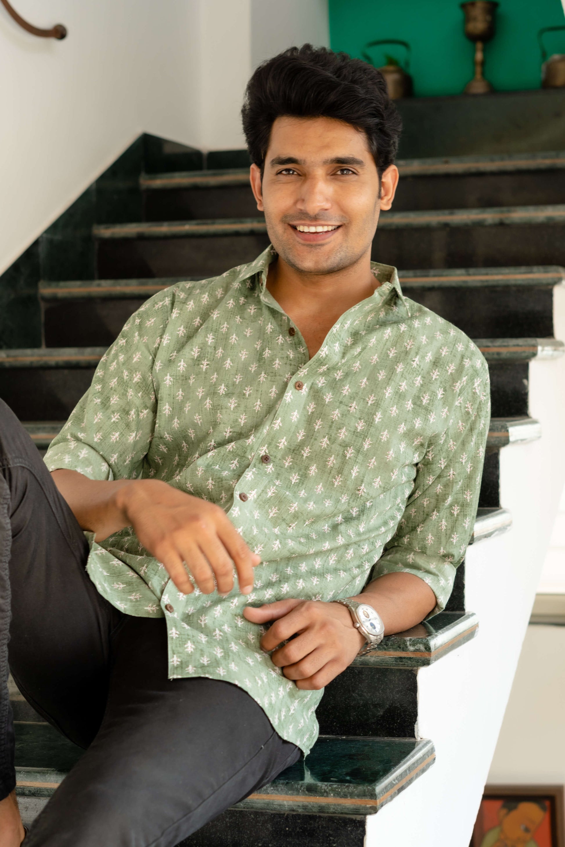 Indian man wearing green colour shirt