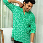 Indian man wearing green short kurta
