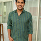 Indian man wearing green colour shirt