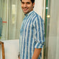 Indian man wearing blue short kurta