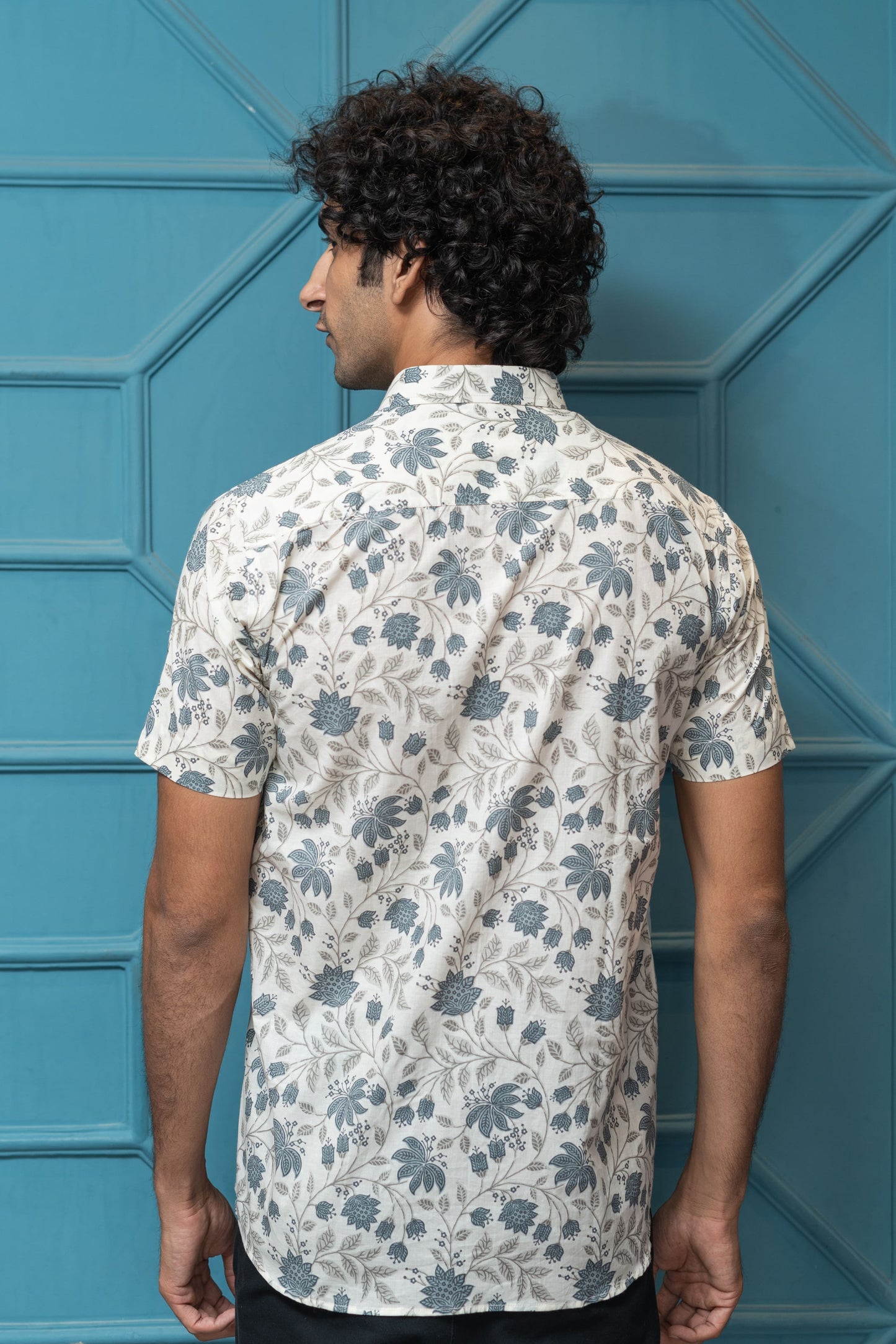 The White Half Sleeves Shirt With All-Over Floral Print