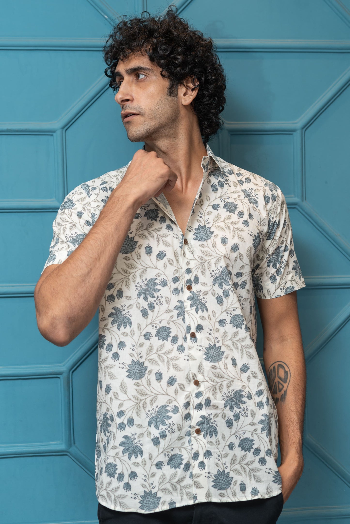 The White Half Sleeves Shirt With All-Over Floral Print
