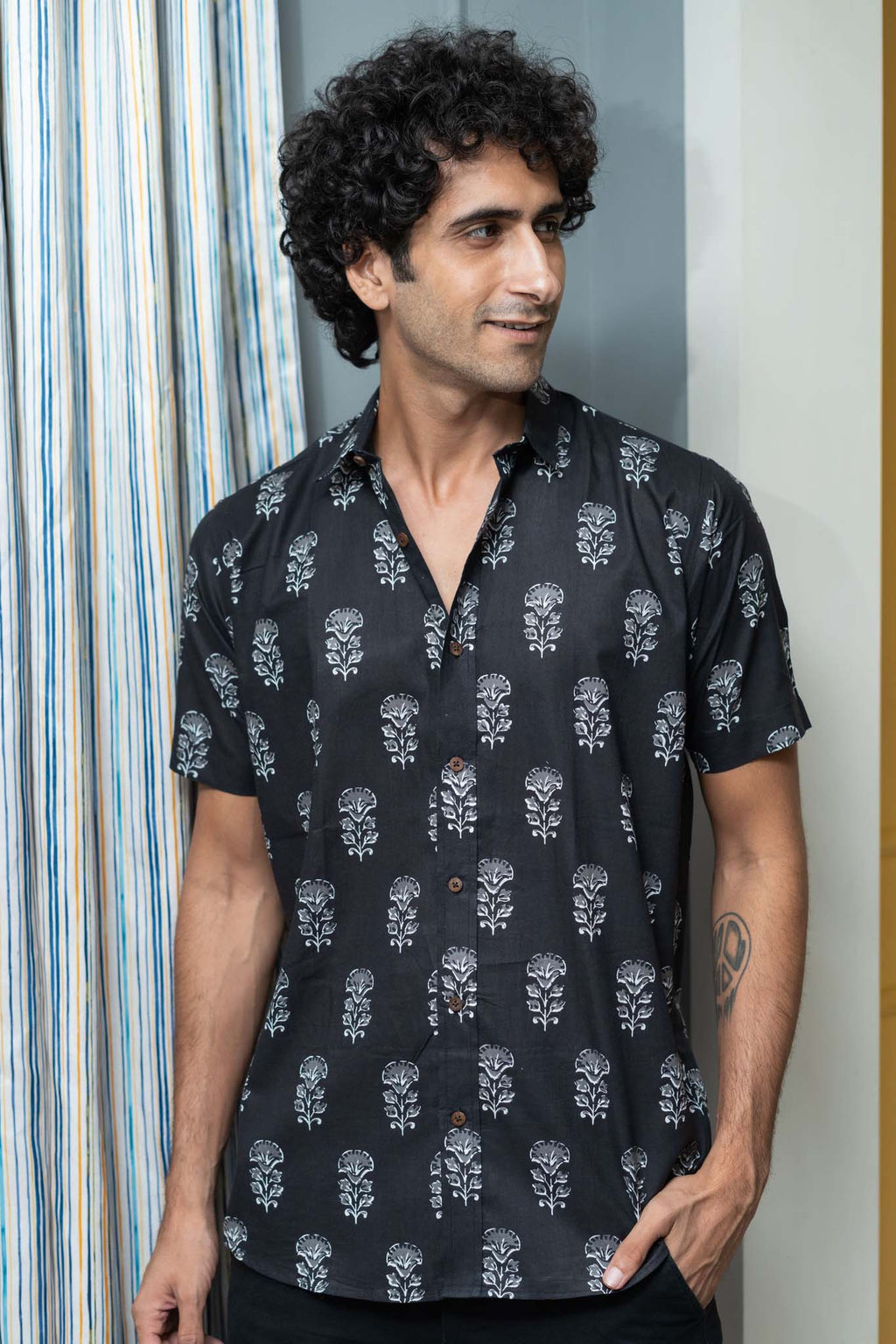 The Black Half Sleeves Shirt With White Flower Print