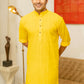 An Indian Man Wearing Yellow color Long Kurta 